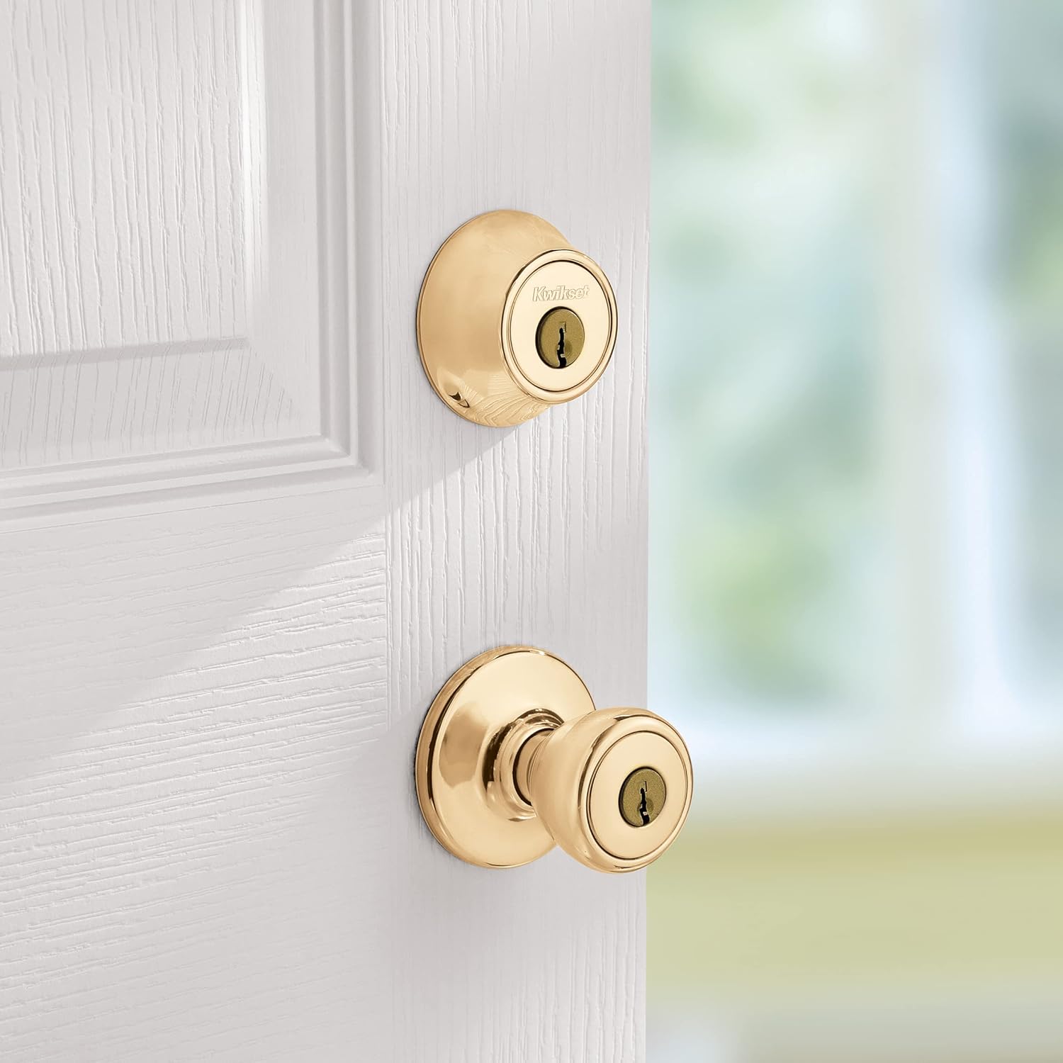 Kwikset patio door entry and deadbolt combo in polished brass
